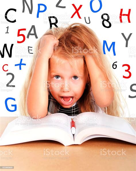Schoolgirl Pulling Blonde Hair In Stress With Numbers And Letters Stock