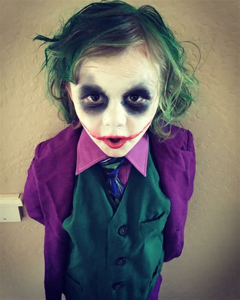 While his look may have changed through the years, his love of the color purple and mayhem stays the same in the dark knight. The Joker Kid's Costume | Joker halloween costume, Joker ...