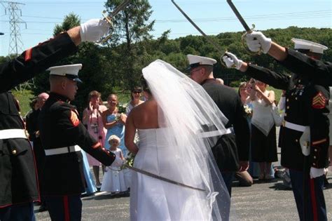 here s the history behind these popular military wedding traditions