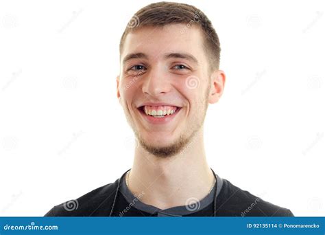 Young Handsome Guy Is Cheerful Smiles On Camera Close Up Stock Photo