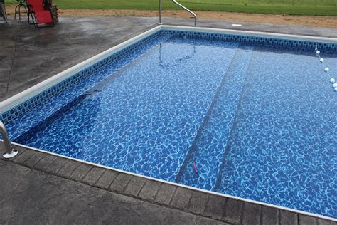 Vinyl Liner Swimming Pool With Sun Deck And Full Width Steps Raft To