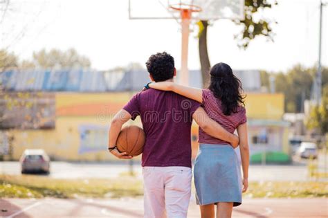 Couple Walking On Basketball Court Stock Image Image Of Friendship