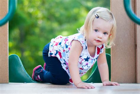 Little Girl Playing At The Park Stock Photo Image Of Green Blue