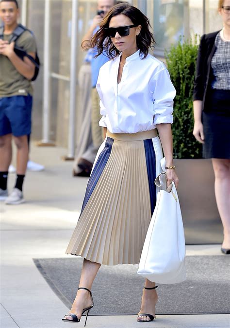 Victoria Beckhams Wears White Shirt And Pleated Skirt In Nyc