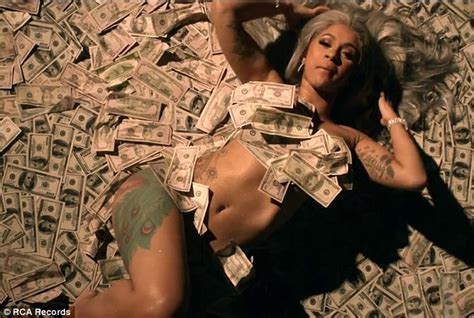 Cardi B Covers Her Nakedness With Hundred Dollar Bills In New Video