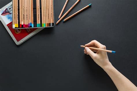 Person Holding Brown Pencil Photo Free Art Image On Unsplash