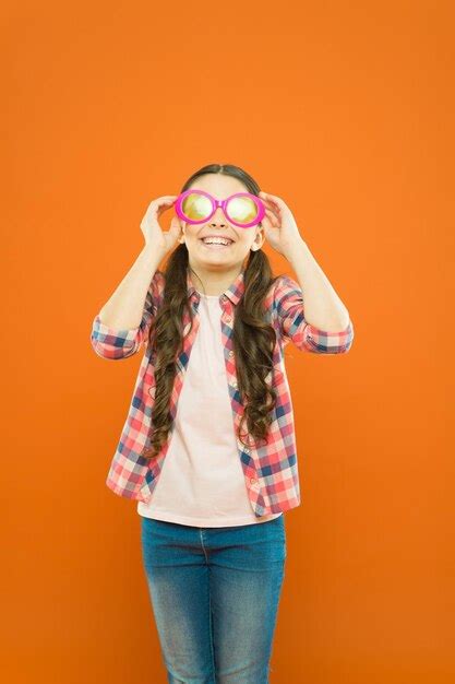 Premium Photo Girl Kid Wear Eyeglasses Optics And Eyesight Treatment