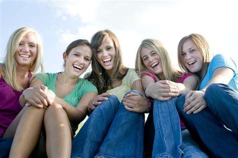 5 Girls Sitting Together And Laughing Stock Photo Image Of Group