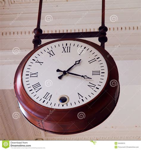 He's out there at six o'clock in the morning, rain or shine. Old Ceiling Clock Stock Photo - Image: 36433310