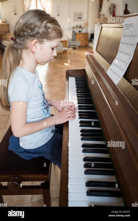 Girl Is Playing The Piano Hi Res Stock Photography And Images Alamy