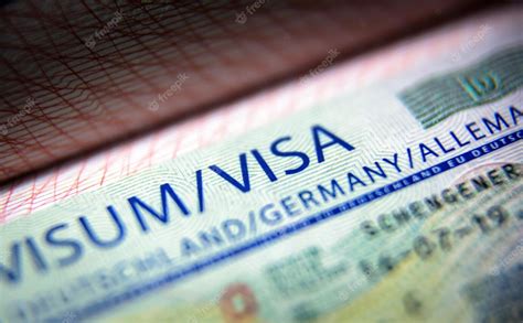 Premium Photo Visa Stamp In Passport Closeup German Visitor Visa At