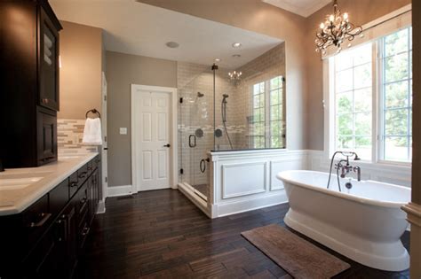 There is a bath to ceiling window beside a deep and luxurious bathtub which. 35 Best Traditional Bathroom Designs