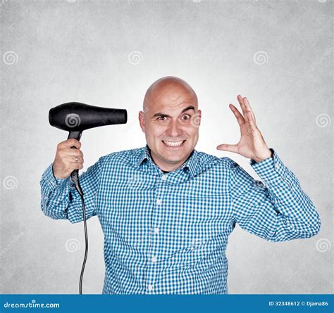 bald gangster armed with baton outdoors at night stock image 19895245