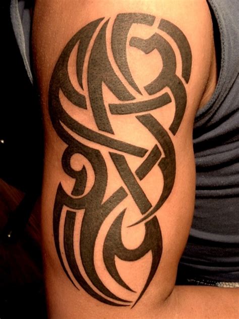 Best Tribal Tattoo Designs For Mens Arm