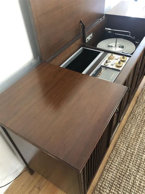 This piece comes with an operating guide. Zenith Mid Century radio record player console stereo ...