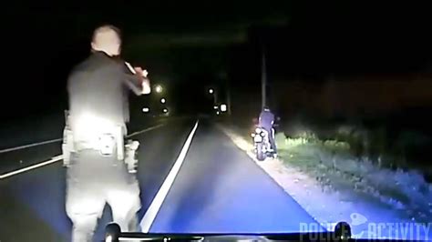 Police Officer Accidentally Shoots Fleeing Motorcyclist Youtube