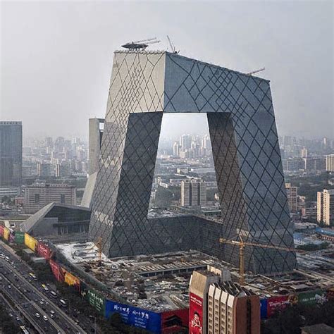 Both towers exhibit an inward incline of six degrees on each plane and are supported by braced steel tubes at the grid's perimeter. China Central Television Headquarters Beijing China ...