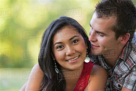 Mixed Race Couple Spending Quality Time Together In A Park In Autumn St Albert Alberta