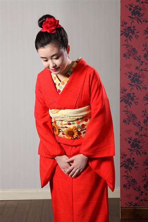 Japanese Woman In Kimono Bowing