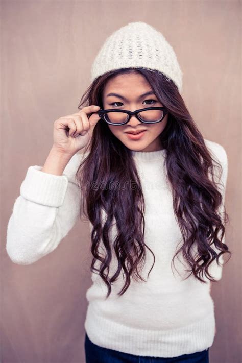 Smiling Asian Woman Holding Eyeglasses Stock Image Image Of Elegant
