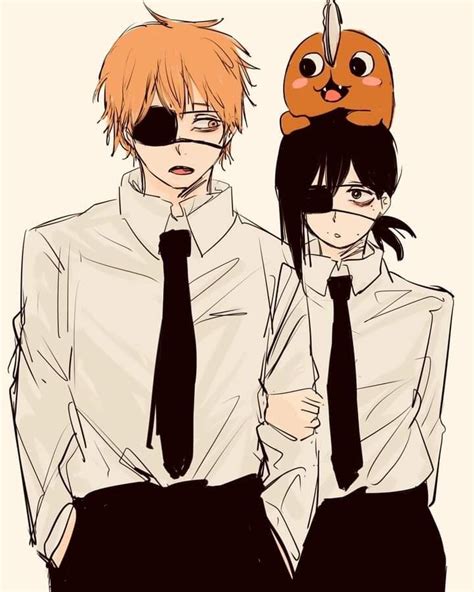 Two People Wearing Black Ties And White Shirts With An Orange Cat On
