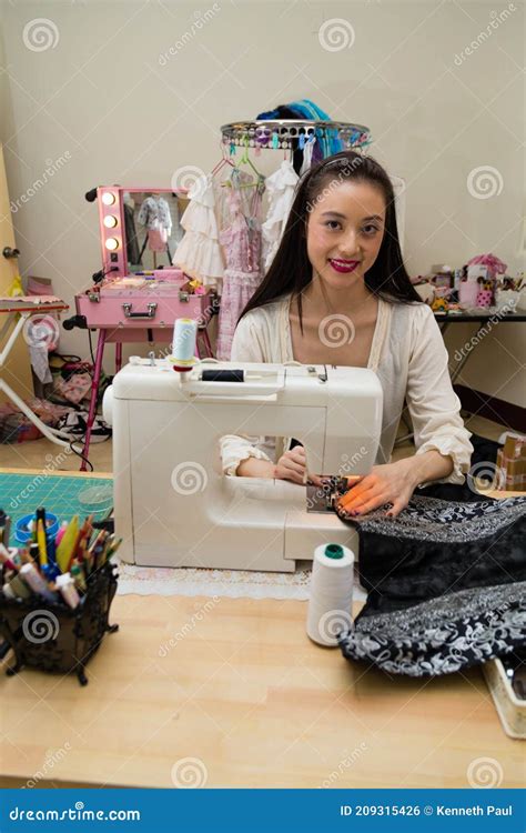 Fashion Designer At Sewing Machine Stock Photo Image Of Smiling