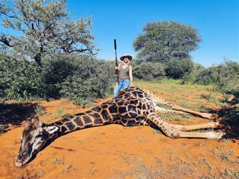 South African Trophy Hunter Proudly Poses With Giraffe Heart