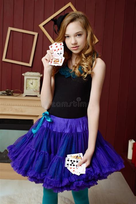 Young Girl At The Image Of Alice In Wonderland Stock Image Image Of