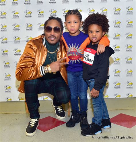 Rapper Future Poses With His Children At A Charity Event In Atlanta