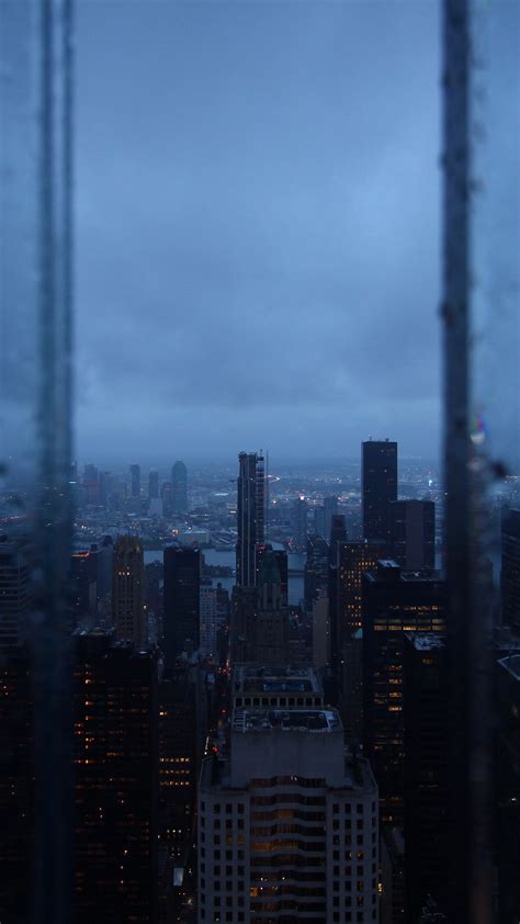 Download Wallpaper 1350x2400 Night City Window Rain Skyscrapers