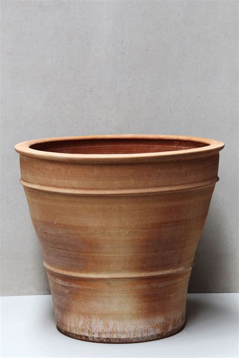 Our pots can go directly from the refrigerator to a hot oven and. Earthenware Clay Pot Cookware - Rustic clay pots stock ...