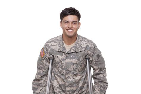 Portrait Of A Soldier With Crutches Smiling Stock Image Image Of
