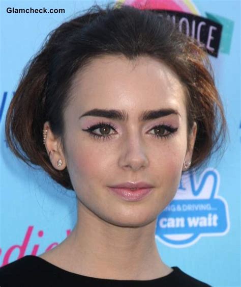Lily Collins In 60s Style Bun And Makeup