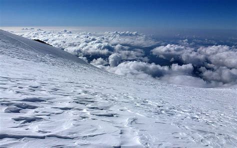 Hd Wallpaper Snowy Mountain Peak Above The Clouds White Clouds