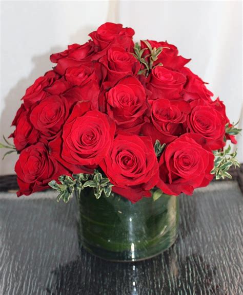 What Says Romance Or Pure Tradition Two Dozen Red Roses Is The