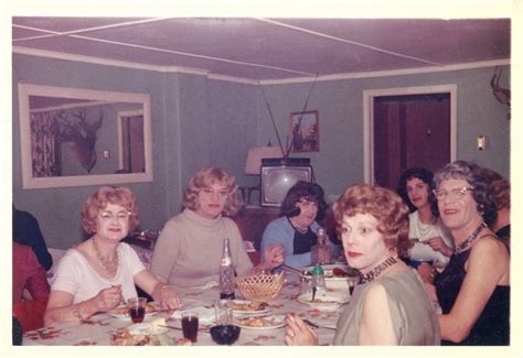 A Group Of Women Sitting Around A Table Eating Food