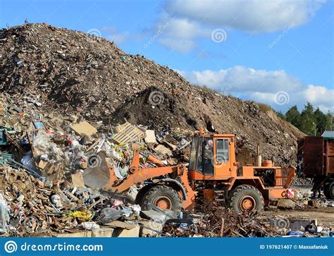 Front End Loader Works In A Landfill For The Disposal Of Construction