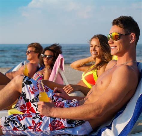 Friends Relaxing On A Beach Stock Image Image Of Bottle Beer