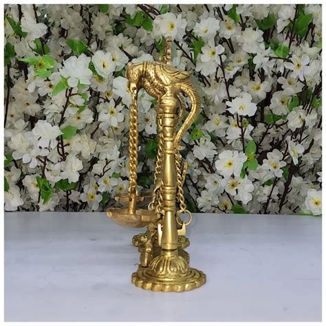 Brass Ganesha Statue On Swing With Diya Ganesh Idol On Jhoola Etsy In