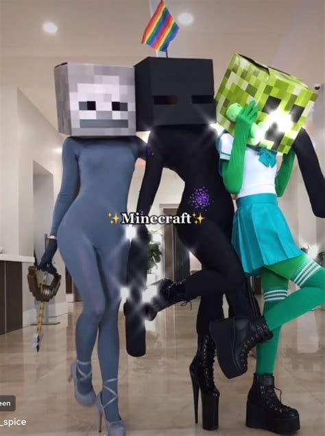 Three People Dressed Up As Minecraft Characters