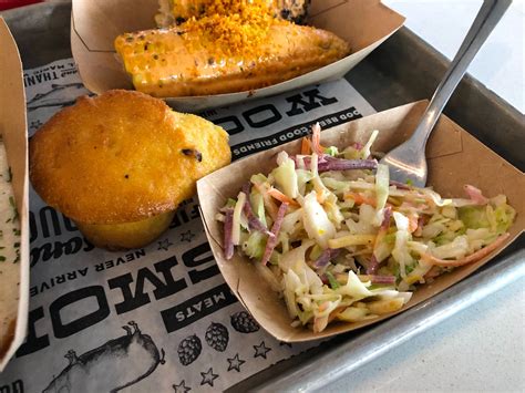 PHOTOS REVIEW The Polite Pig Reopens At Disney Springs With Branded