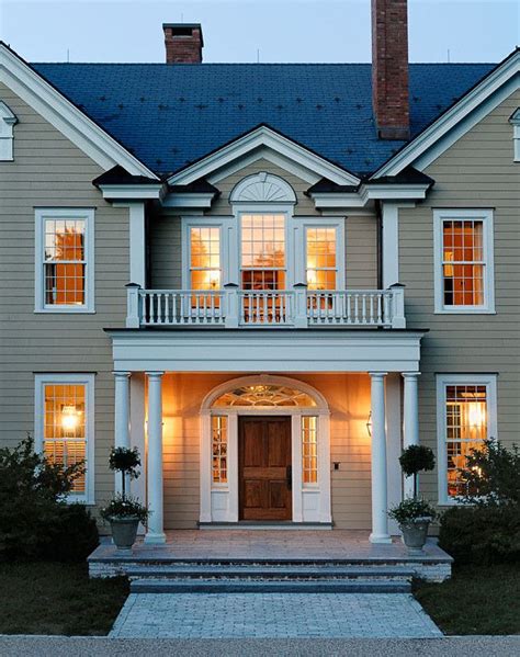 Beautiful Traditional Home Exterior With Siding Painted In Autumn Tan