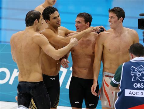 The Usa Swim Team Led By Michael Phelps Win The Gold Medal Over The