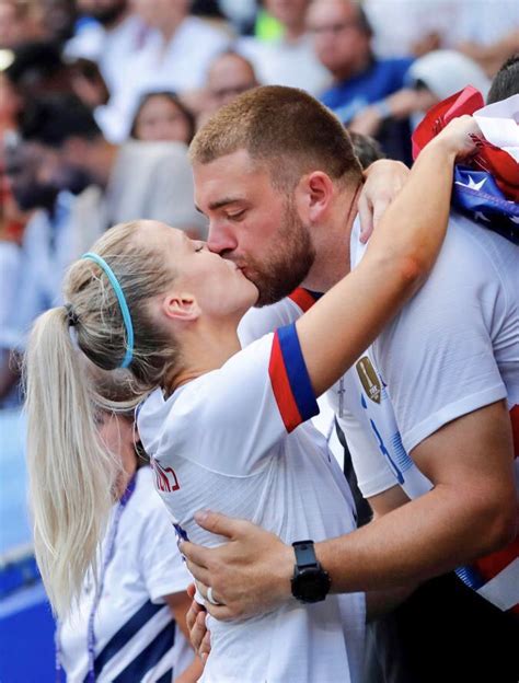 julie ertz 8 uswnt shares a kiss with her husband in the stands after usa won the 2019 fifa