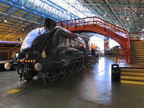 The A4 Mallard Passes Under A Footbridge Inside The Main Hall Of The