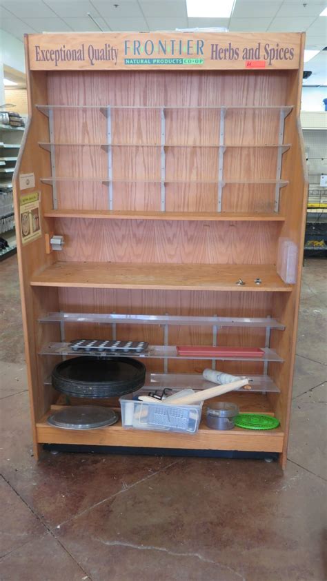 These units keep products safely displayed under lock and key. Wooden Merchandise Display Cabinet w/ Shelving - Oahu Auctions