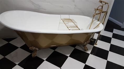 The bonus is that it holds the heat beautifully for a nice long soak. Prodigg cast iron bath with gold exterior and gold claw ...