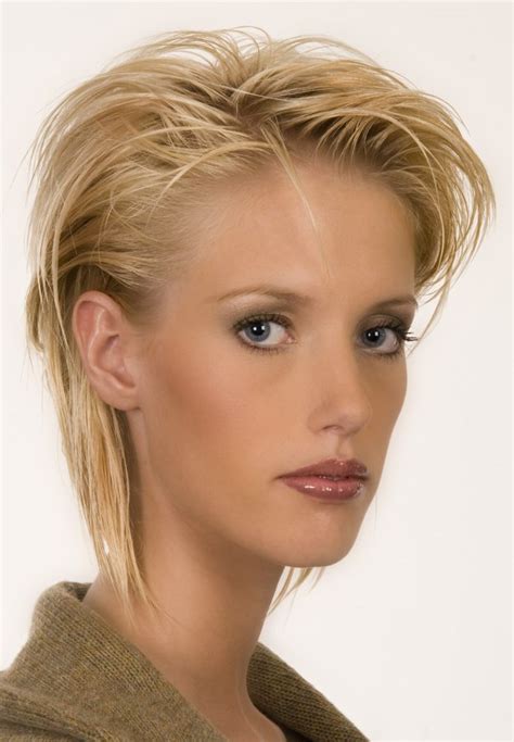 Comb the hair after applying the gel. Short hair with irregular strands and styled behind the ...