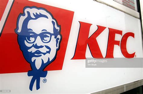 Kfc Signage Is Visible On A Door Of A Cigarette Smoke Free News