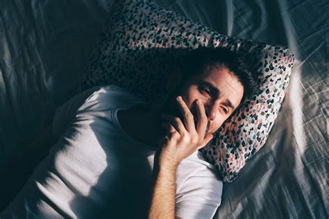 Young Depressed Man Crying In Bed Pathways